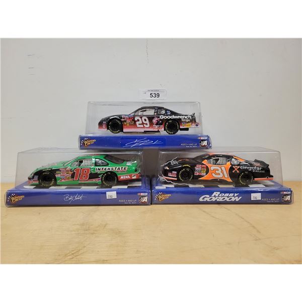 THREE NASCAR DIE CAST CARS UNOPENED