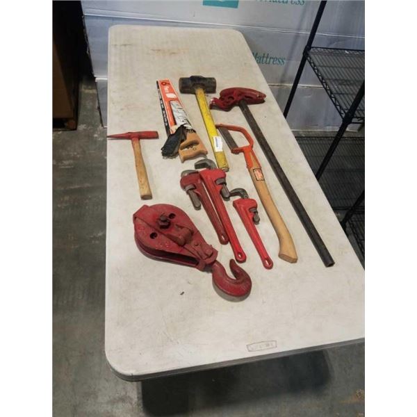 LOT OF SLEDGE HAMMERS, SAWS, PIPE WRENCHES, BLOCK AND TACKLE PULLEY WITH HOOK