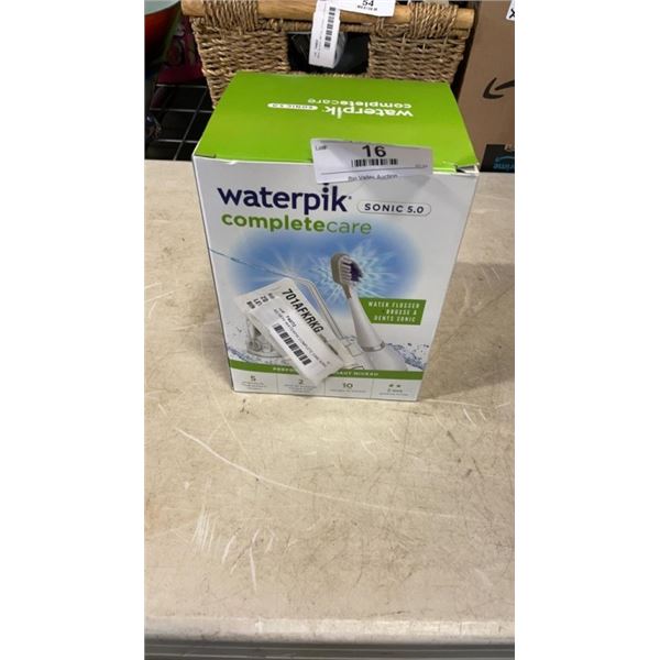 AS NEW WATERPIK COMPLETE CARE SONIC 5.0