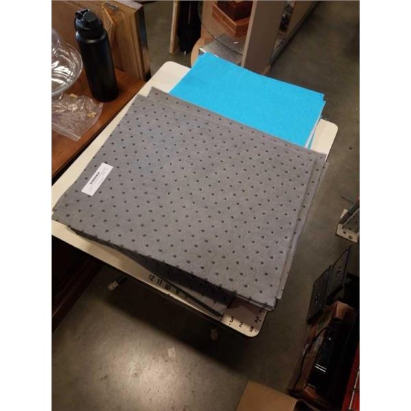 100 NEW ABSORBANT LARGE SPILL PADS AND 3 NEW WATERPROOF FOLDING PADS