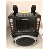Image 2 : Karaoke USA Machine with two microphones and Remote - new without box