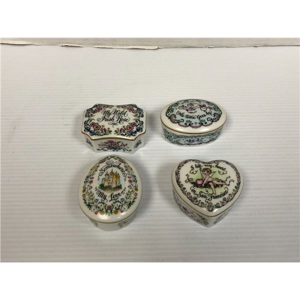 Group of four collectible Music Boxes from Franklin Porcelain - Songs are on the Lids from the World