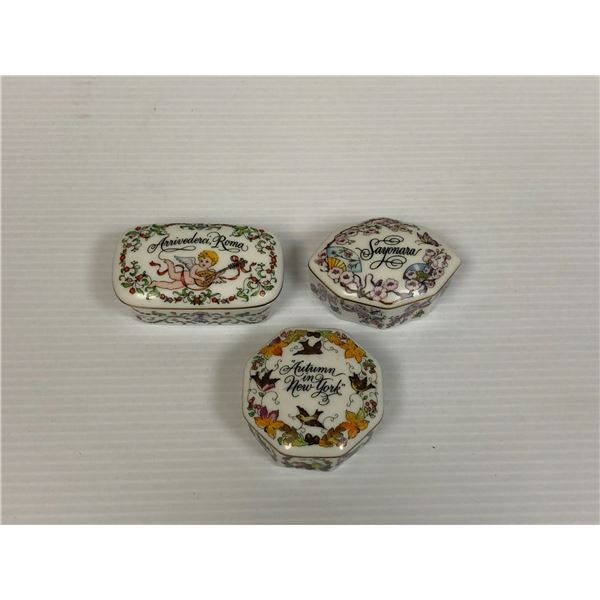 Group of three collectible Music Boxes from Franklin Porcelain - Songs are on the Lids from the Worl