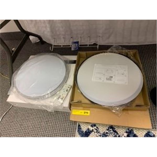 Group of Two Large LED Ceiling Light Fixtures - one with Silver Trim and the other Black