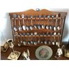 Image 2 : Elk Bone Carving Set, assortment of Teaspoons on Wood Rack, Decorative Egg Shaped Rock, Black Vase, 