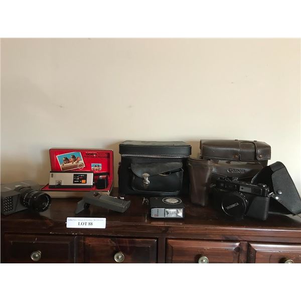 Yashica Electric 35 mm Camera w Lens, Canon Zoom 8 Camera w 10-40mm Zoom Lens, 2 Camera Bags, Popula