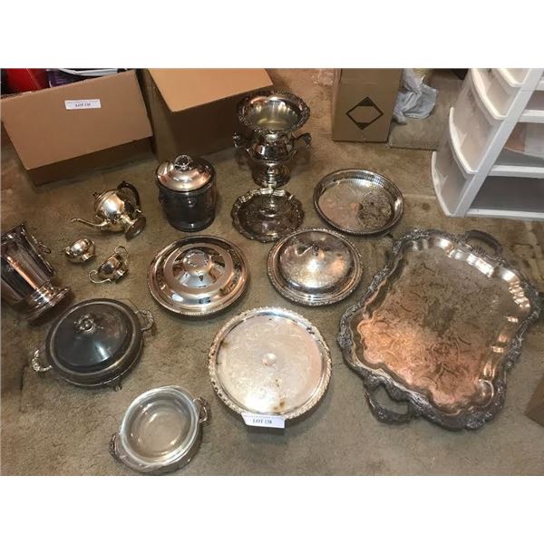 Silver plated set including; huge ornate serving tray, candy dish, teapot with cream and sugar, 2 ch