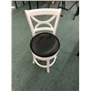 Image 1 : Black and White Round rotating chair with black seat