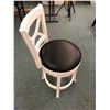 Image 2 : Black and White Round rotating chair with black seat