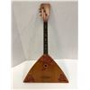 Image 2 : Three string Russian Balalaika from movie set from the Blockbuster partial animated movie