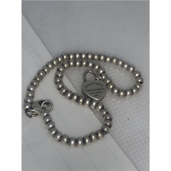 Tiffany & co. .925 Silver Pendant & Bracelet Chain- theft recovery
