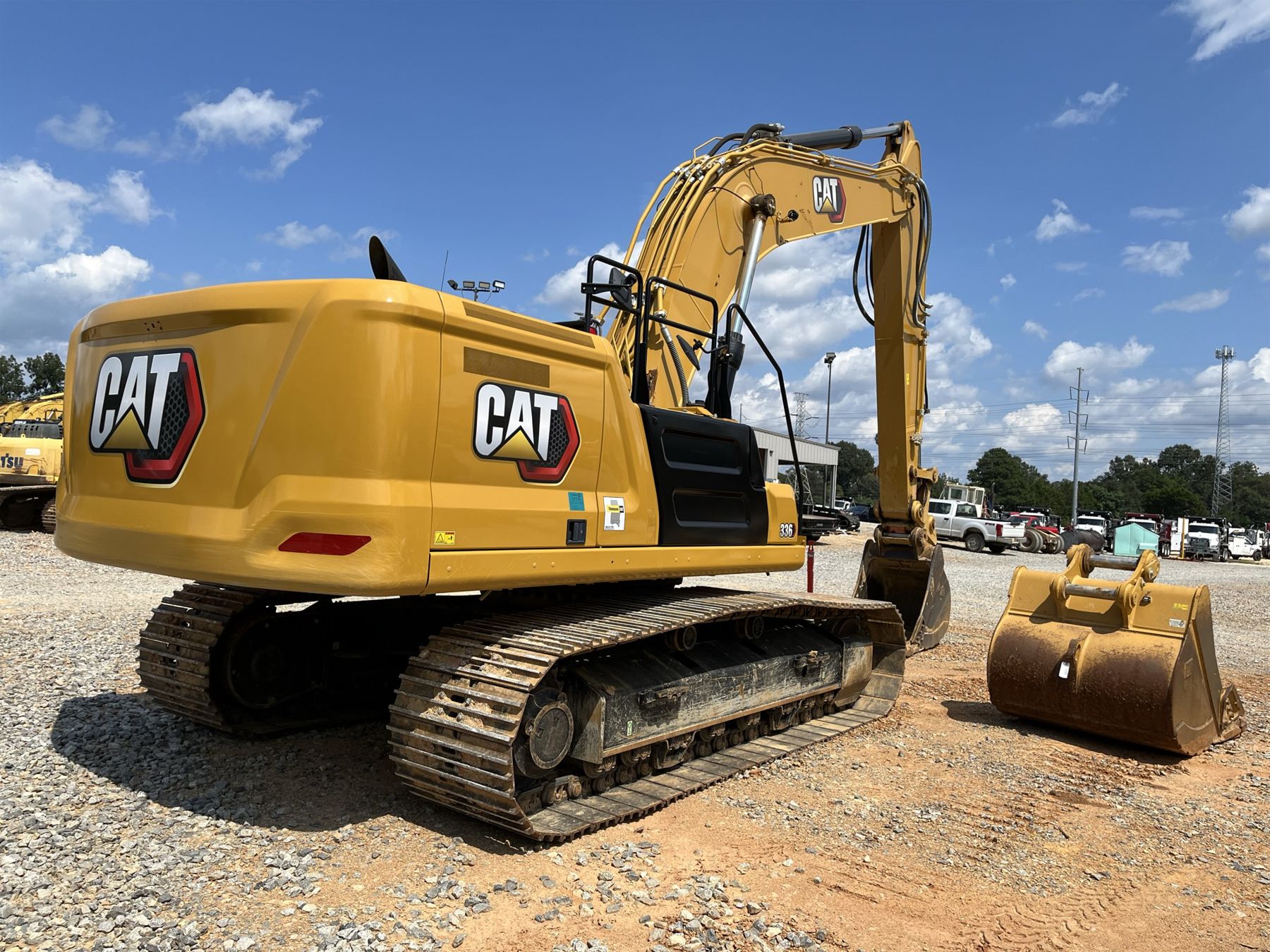 336 Trackhoe 2022 CAT 336 Excavator - J.M. Wood Auction Company, Inc.