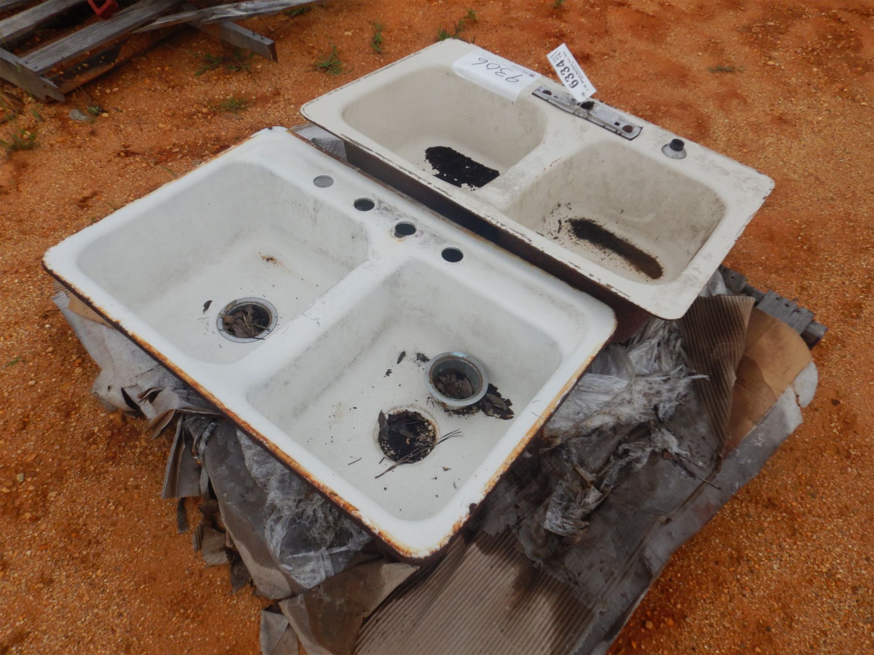 (2) CAST IRON SINKS (C6) J.M. Wood Auction Company, Inc.