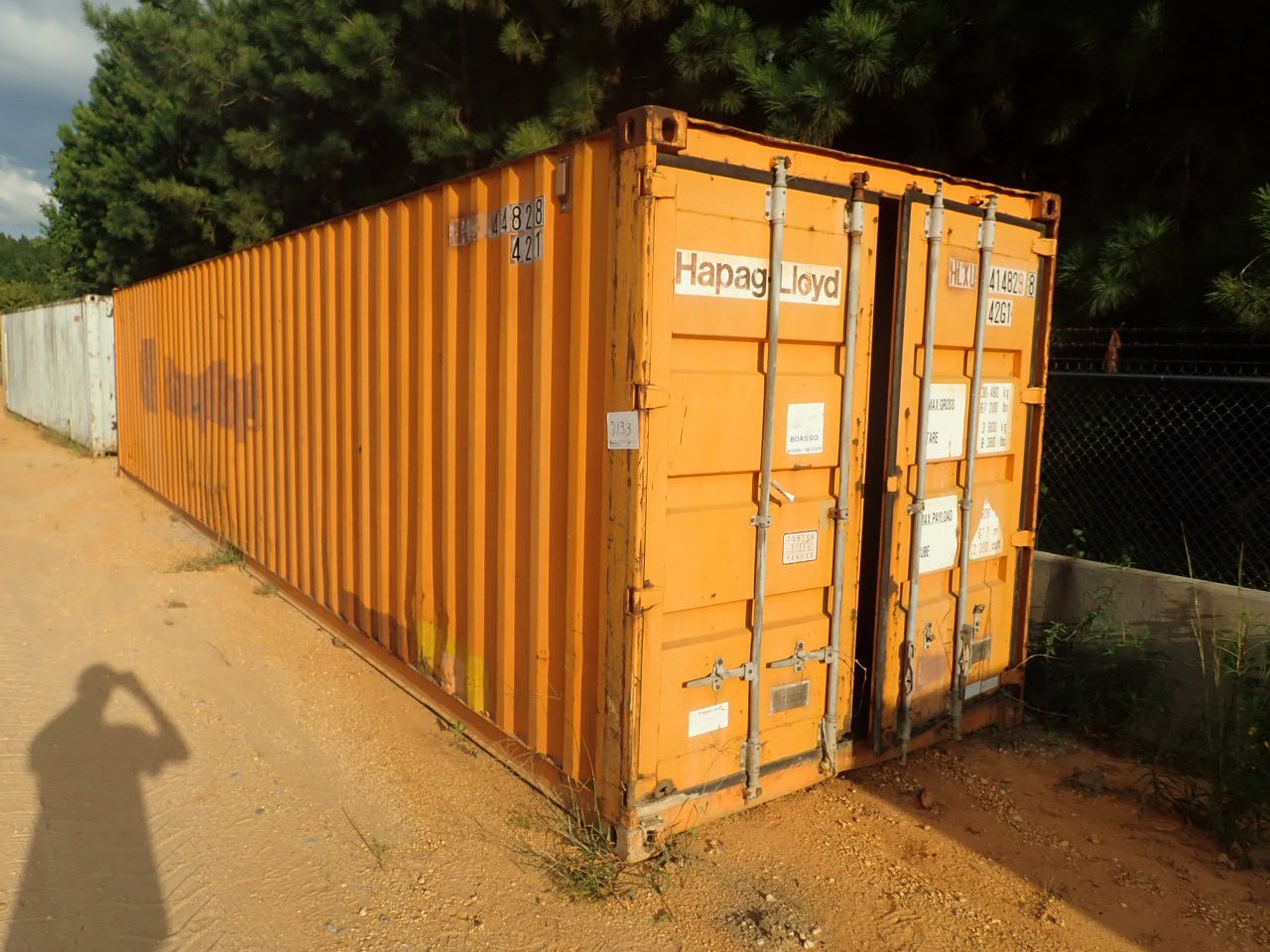 40' STEEL SHIPPING CONTAINER W/MISC CONTENTS (B-9)