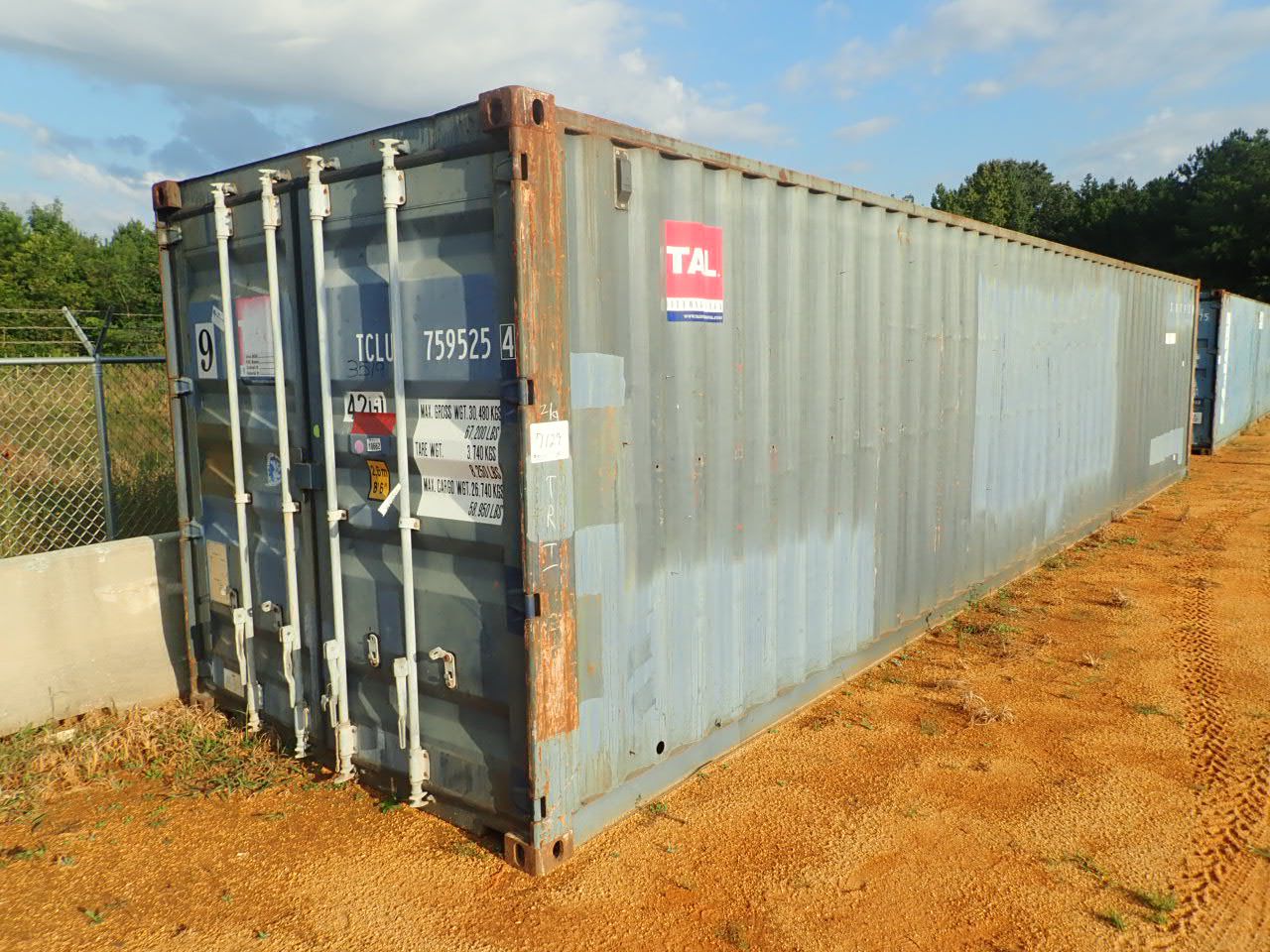 40' STEEL SHIPPING CONTAINER (B-7) - J.M. Wood Auction Company, Inc.