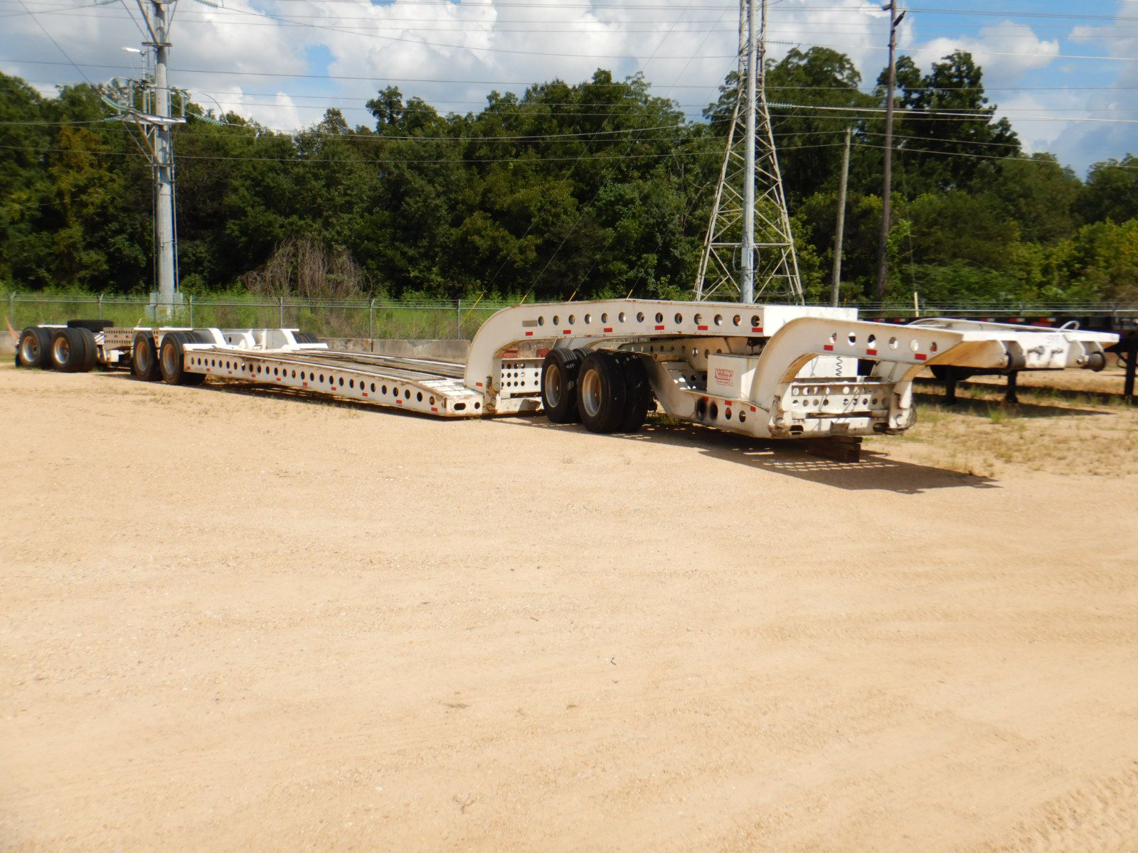 1989 COZAD Lowboy Trailer - J.M. Wood Auction Company, Inc.
