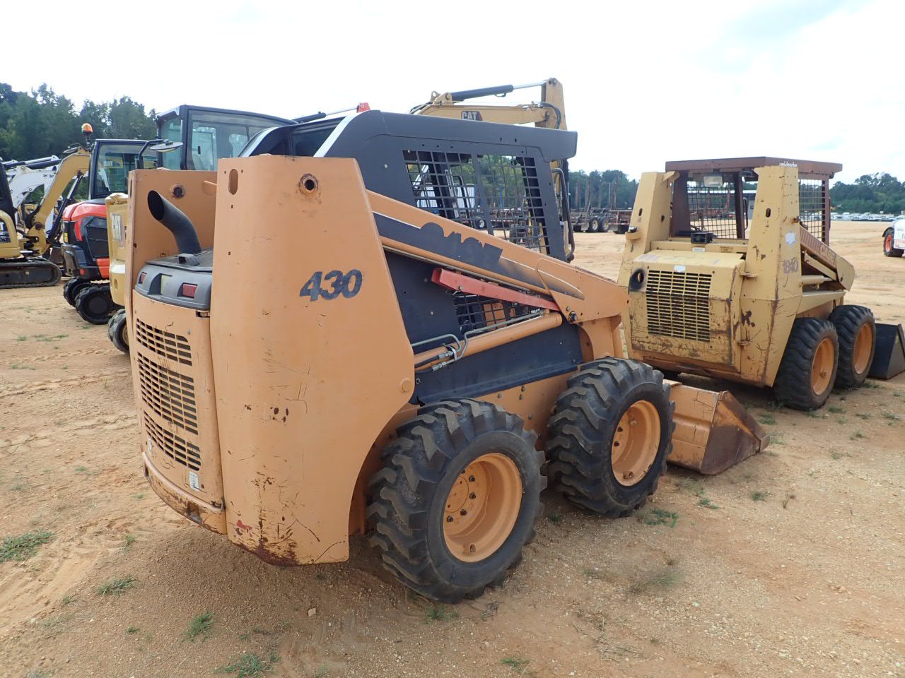 2006 CASE 340 Skid Steer Loader Wheel J.M. Wood Auction Company, Inc.