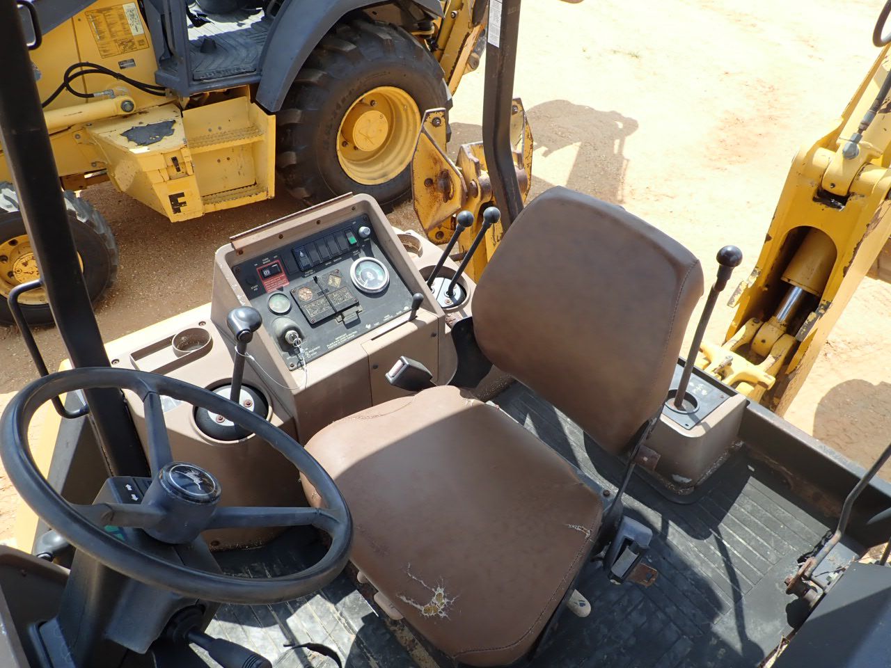 1996 JOHN DEERE 310D Backhoe J.M. Wood Auction Company, Inc.