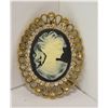Image 1 : OVAL CAMEO BROOCH WITH BLACK BACKGROUND