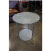 Image 2 : 2 GLASSTOP ENDTABLES AND METAL CANDLE STAND