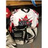 Image 3 : Two Large Boxes of Hockey Protective Gear including Goalie Pads and Jerseys from the Hockey Show