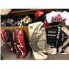 Image 4 : Two Large Boxes of Hockey Protective Gear including Goalie Pads and Jerseys from the Hockey Show