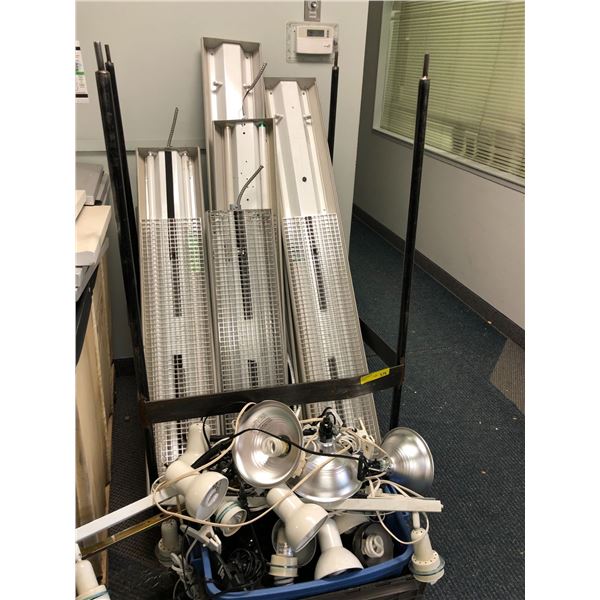 Group Lot of used Fluorescent light fixtures and Spotlights with Rolling metal bin