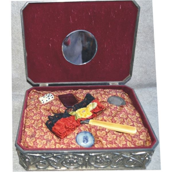gambler’s box with 1888 silver dollar