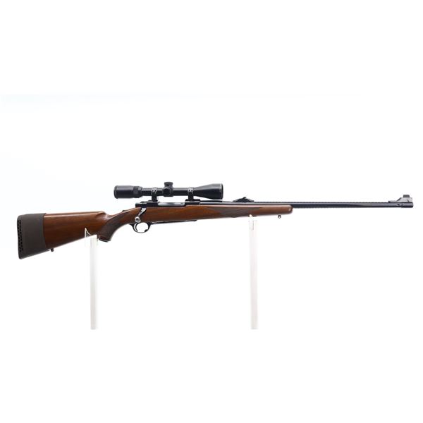 7/10 , RUGER , MODEL: M77 , CALIBER: 338 WIN MAG