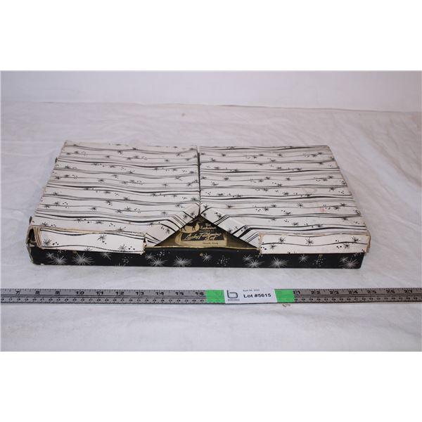 Box with various plastic hangers