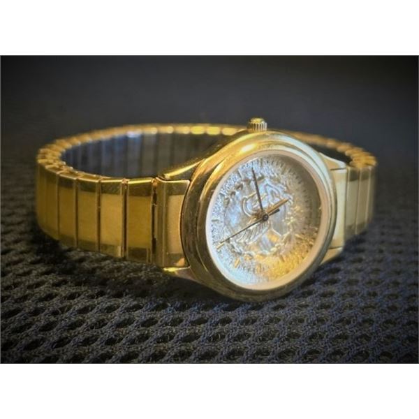 Ladies Watch , Gold Tone with Pegasus