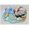 Image 1 : WORLD HANDICRAFTS HOBO NAPPING WITH SHE