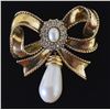 Image 1 : GOLD TONE BOW BROOCH WITH FAUX PEARL