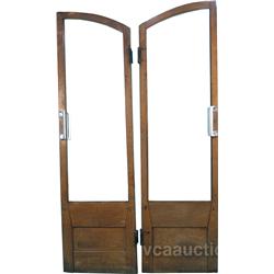 Pair Of Curved Top Swinging Wooden Doors, 1 w/ Beveled