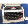 Image 2 : Vintage Remington Portable Typewriter with Manual