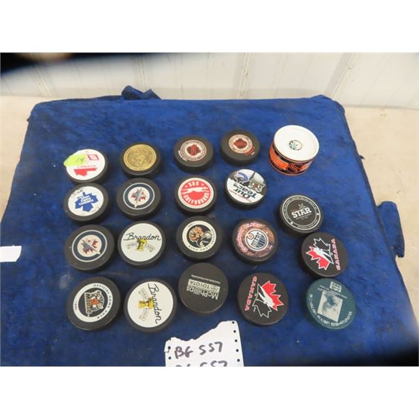 20 NHL, AHL Pucks including 1- 1997 All Star Game Puck