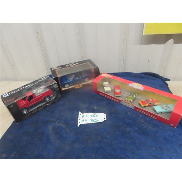 3 Die Cast Vehicles in Packages