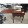 Image 1 : White Cabinet Sewing Machine with Box of Fabric