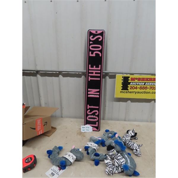 Metal Embossed 'Lost in the 50's ' Sign 6" x 36" & Plush Skate Guards