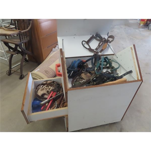 Tack Cabinet Filled with ; Halters, Hoof Trimmers Grooming Tools, Sinch