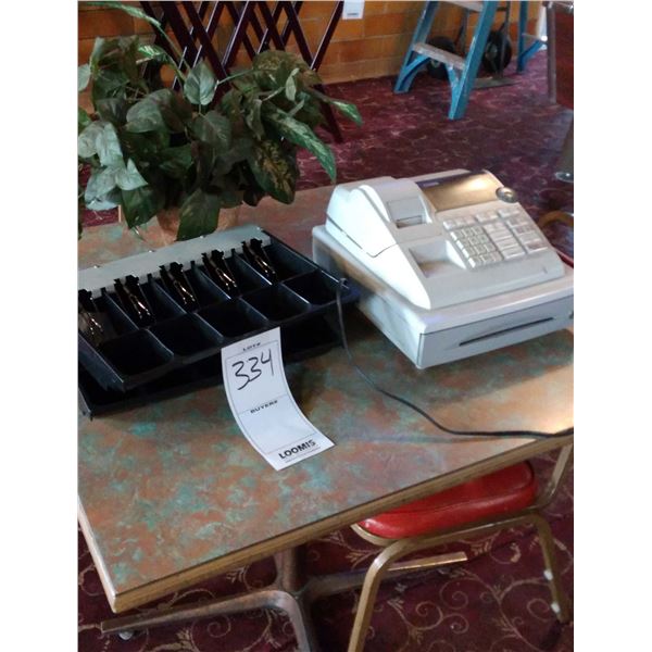 CASH REGISTER, CHANGE DRAWER, PLANT