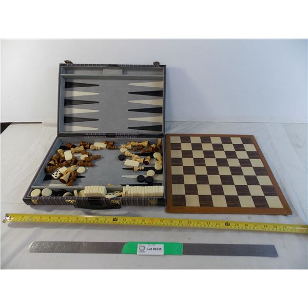 Chess pieces + wood board in backgammon case