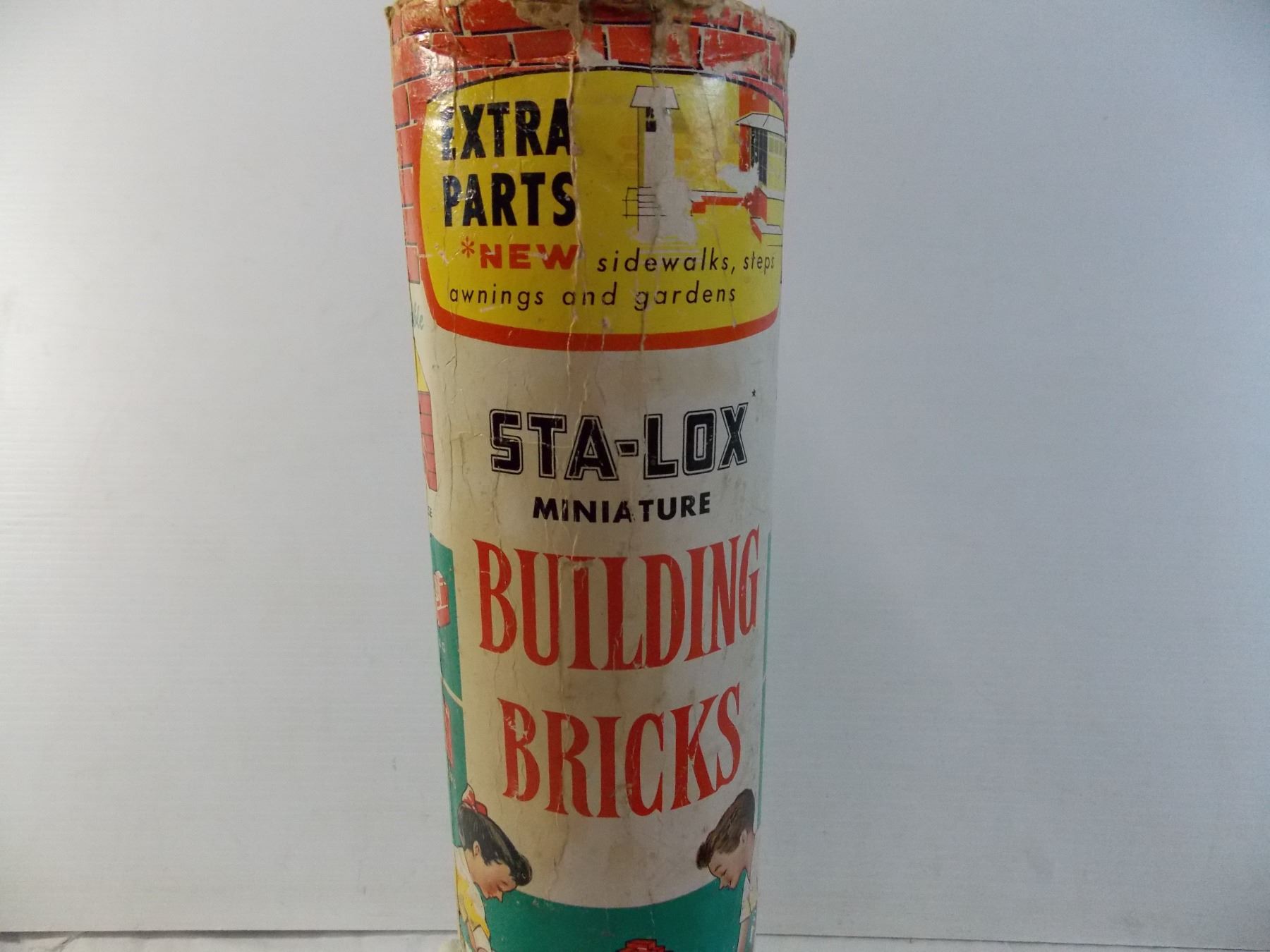 Vintage Sta-Lox Building Bricks in cardboard tube - Bodnarus Auctioneering