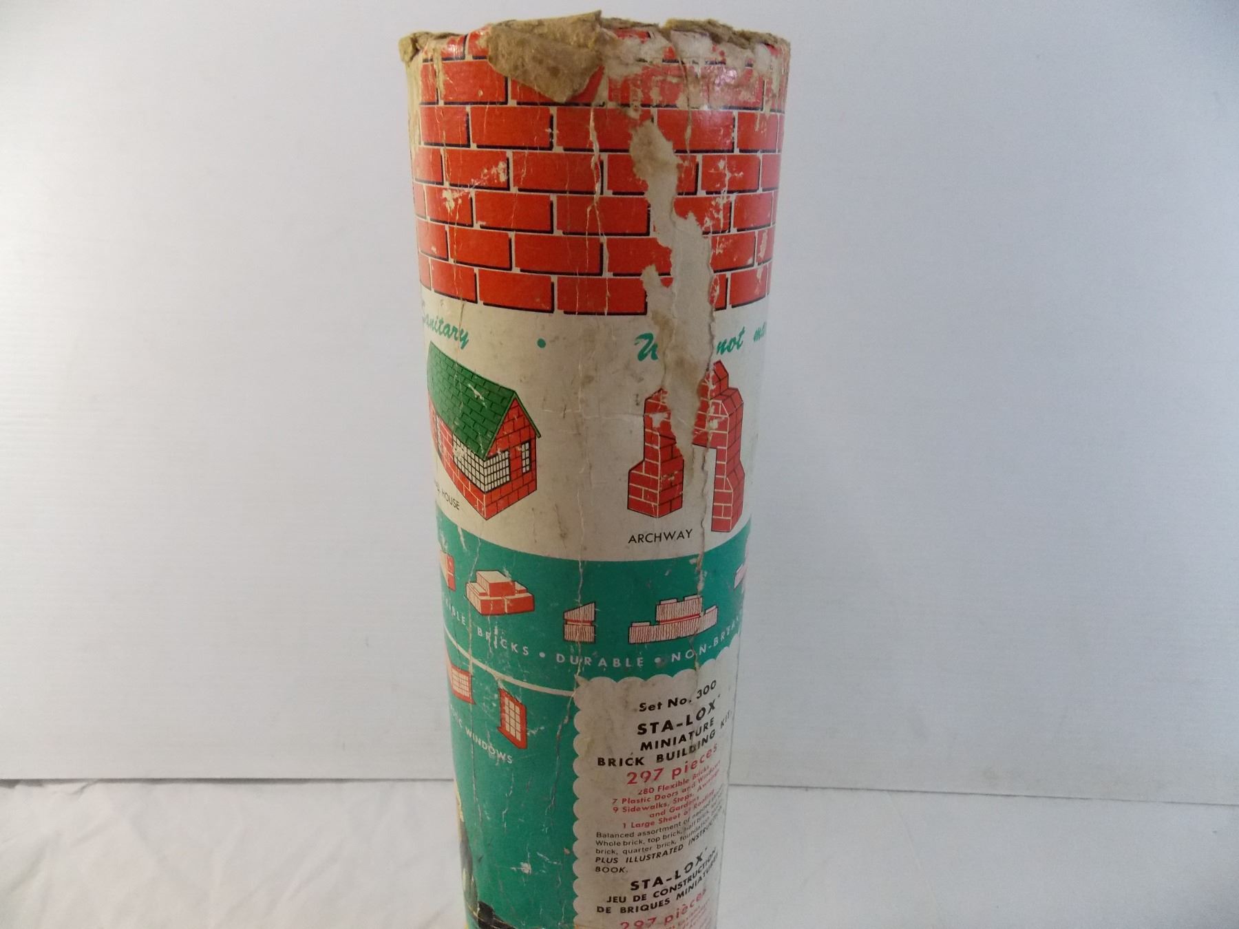 Vintage Sta-Lox Building Bricks in cardboard tube - Bodnarus Auctioneering
