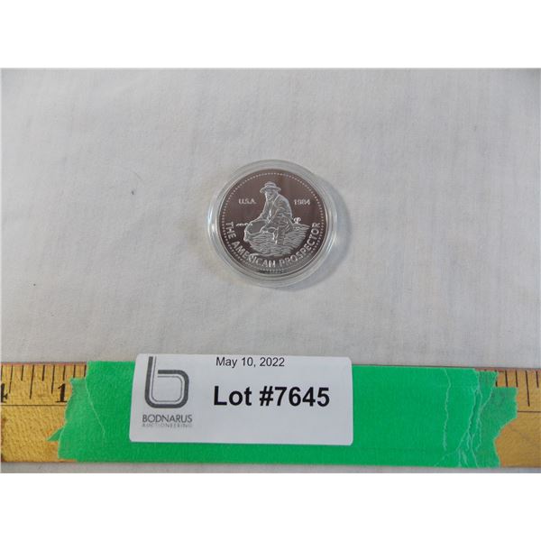 unverified coin - 1984 (1 9/16  round) - cannot guarantee authenticity