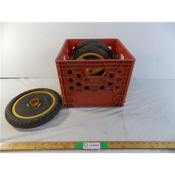 (4) plastic wagon tires in a crate (well used)