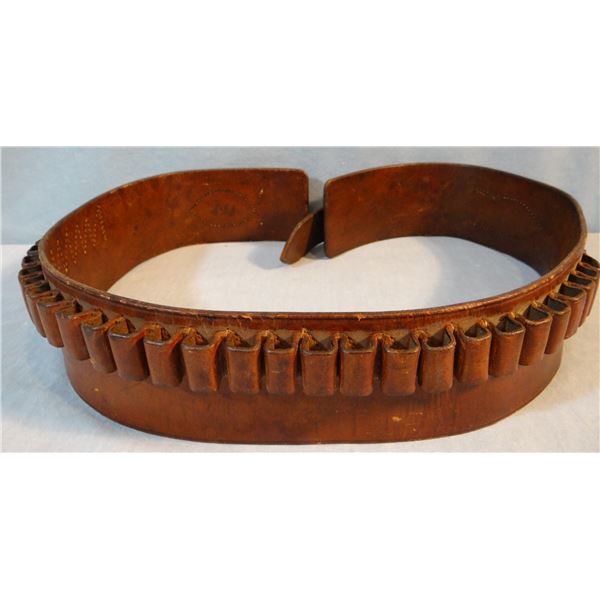 George Lawrence cartridge belt, marked and Studded Leather cowboy cuffs, 6 1/2"