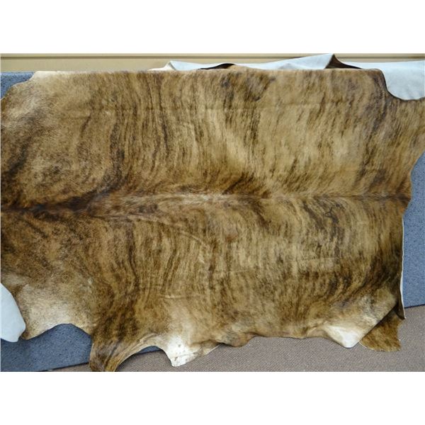 Tanned Longhorn cowhide, 64" x 74"