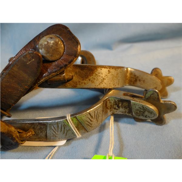 Crockett silver mtd spurs, show some rust and cowboy use, edge of band marked