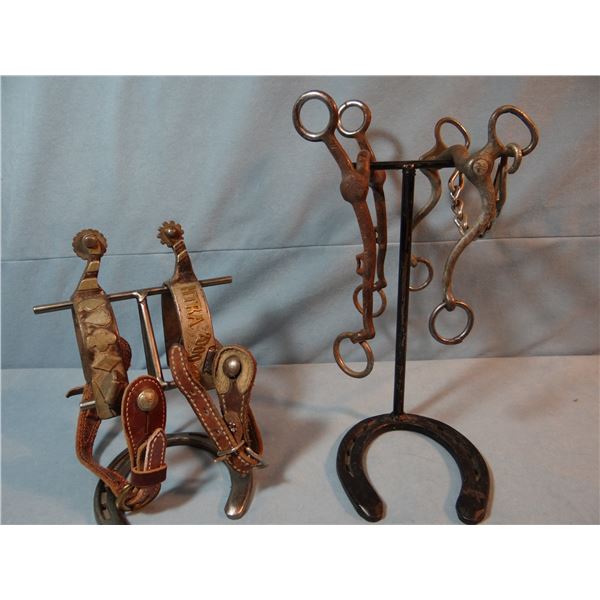 2 older bits and 2 silver mtd. single spurs